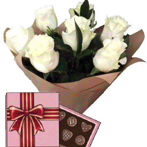 Фото товара 7 белых роз с конфетами в Чернигове